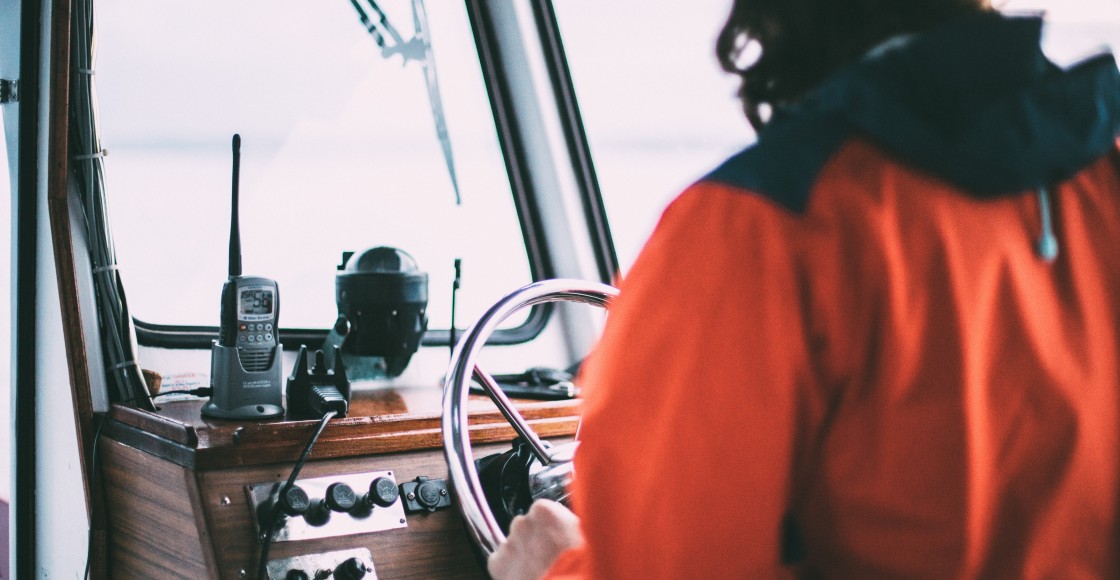 Captain driving a boat