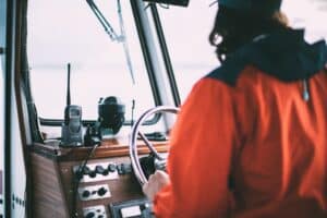 Captain driving a boat