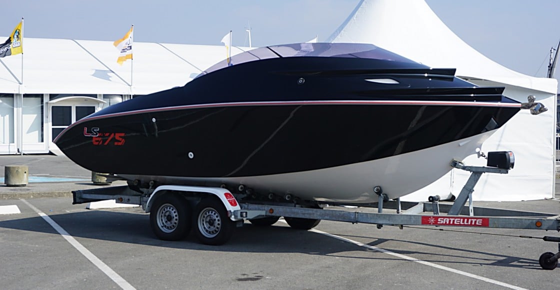 Boat trailer in front of tent