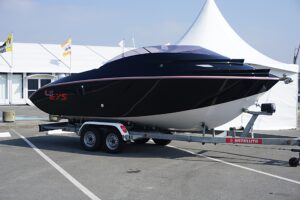 Boat trailer in front of tent