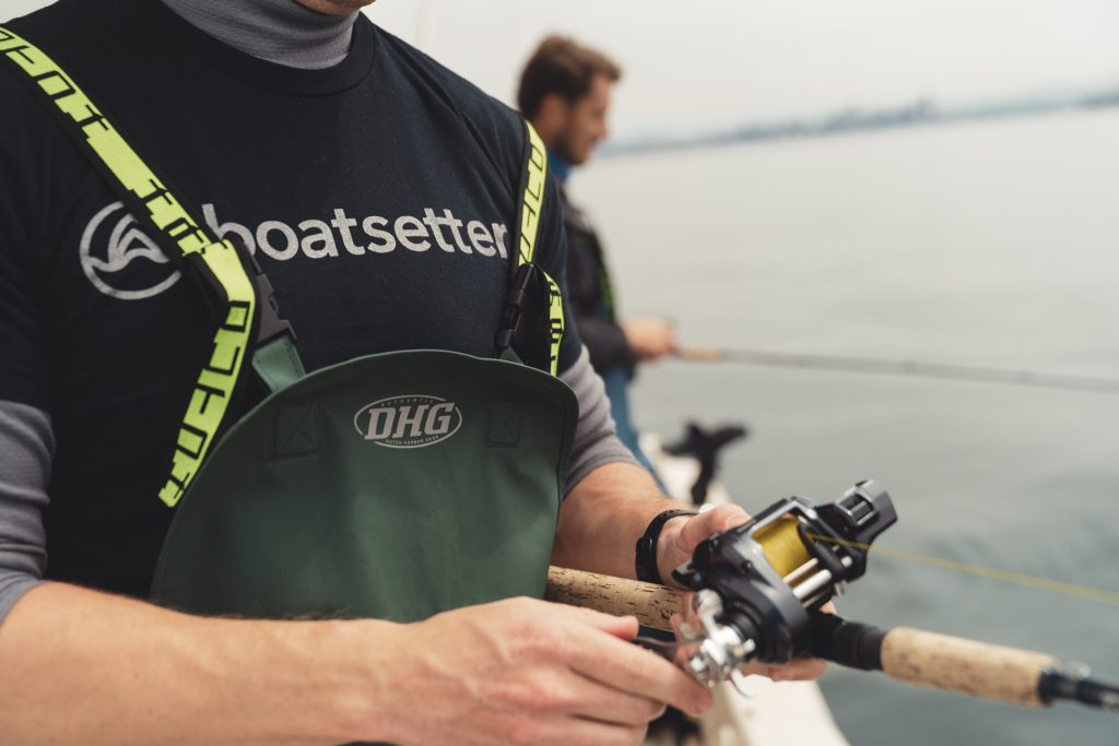 Angler wearing a Boatsetter shirt on a Seattle fishing charter
