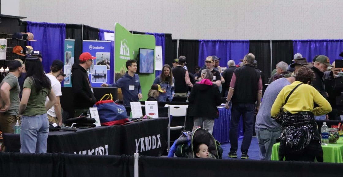 Booths and attendees at the Fly Fishing Show in Denver