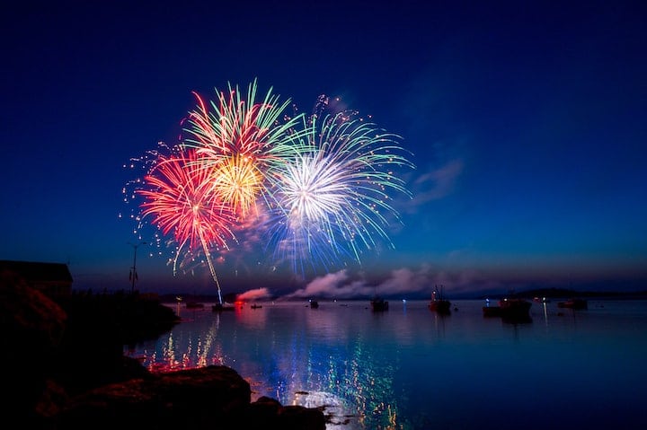 Watching fireworks on a boat.