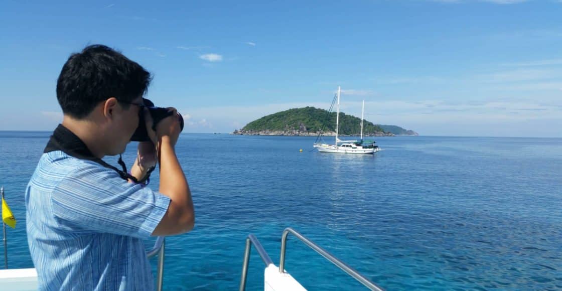 Photographer take a photo of boat