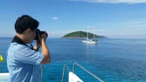 Photographer take a photo of boat
