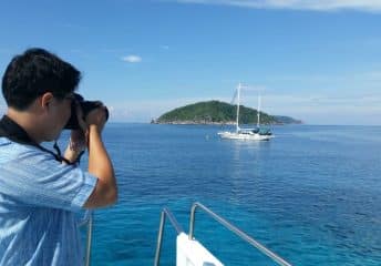 Photographer take a photo of boat