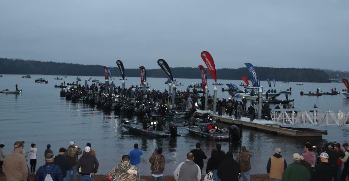 Fans watch the start of a fishing tournament, the Bassmaster Classic, in Greenville, South Carolina