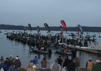 Fans watch the start of a fishing tournament, the Bassmaster Classic, in Greenville, South Carolina