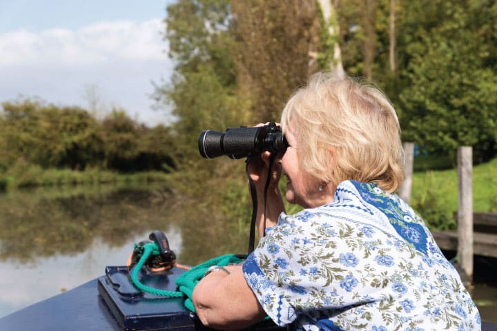 Observing wildlife from a boat.