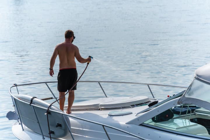 Hosing Off Boat.