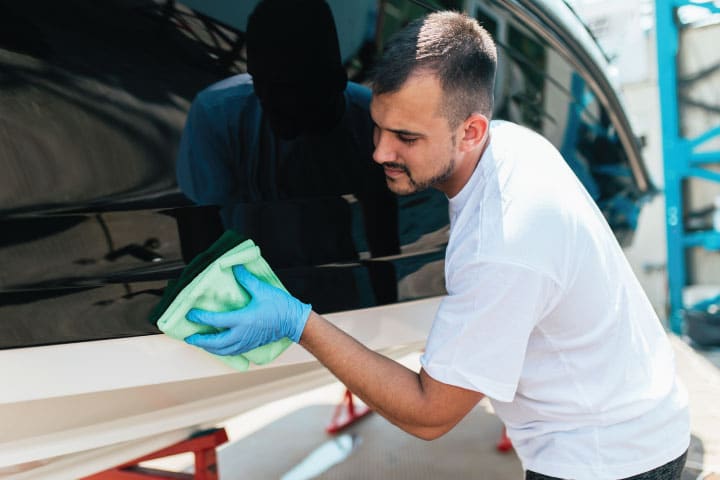 Cleaning a boat.