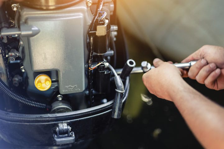 Boat engine maintenance.