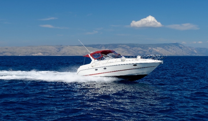 An electric speedboat cruising by.