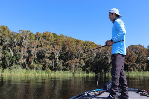 Angler fishing on bass boat in Lake Tarpon, Florida