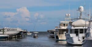 Scenic view of luxurious yachts at a marina in Miami on a sunny day.
