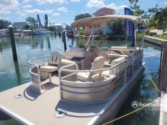 21' Sunchaser Pontoon in Madeira Beach.  Float & cooler included.